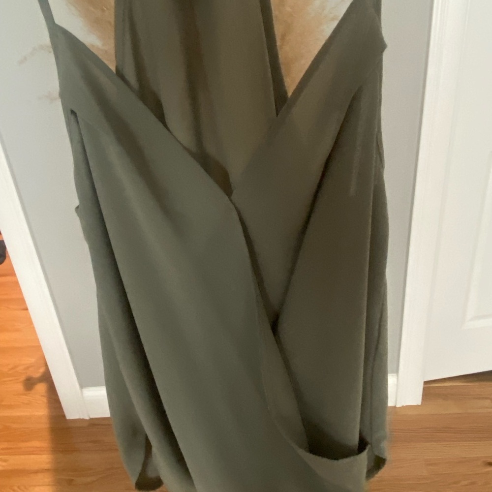Womens olive green spaghetti strap blouse. Never worn.size medium.